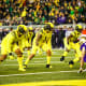 Oregon Ducks linebackers Noah Sewell and Mase Funa prepare for the snap against the Washington Huskies.